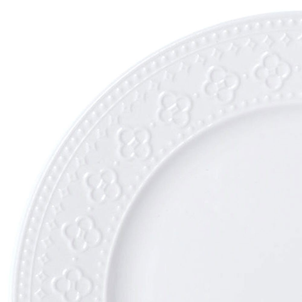 Elegant porcelain dinnerware set with embossed design for special occasions