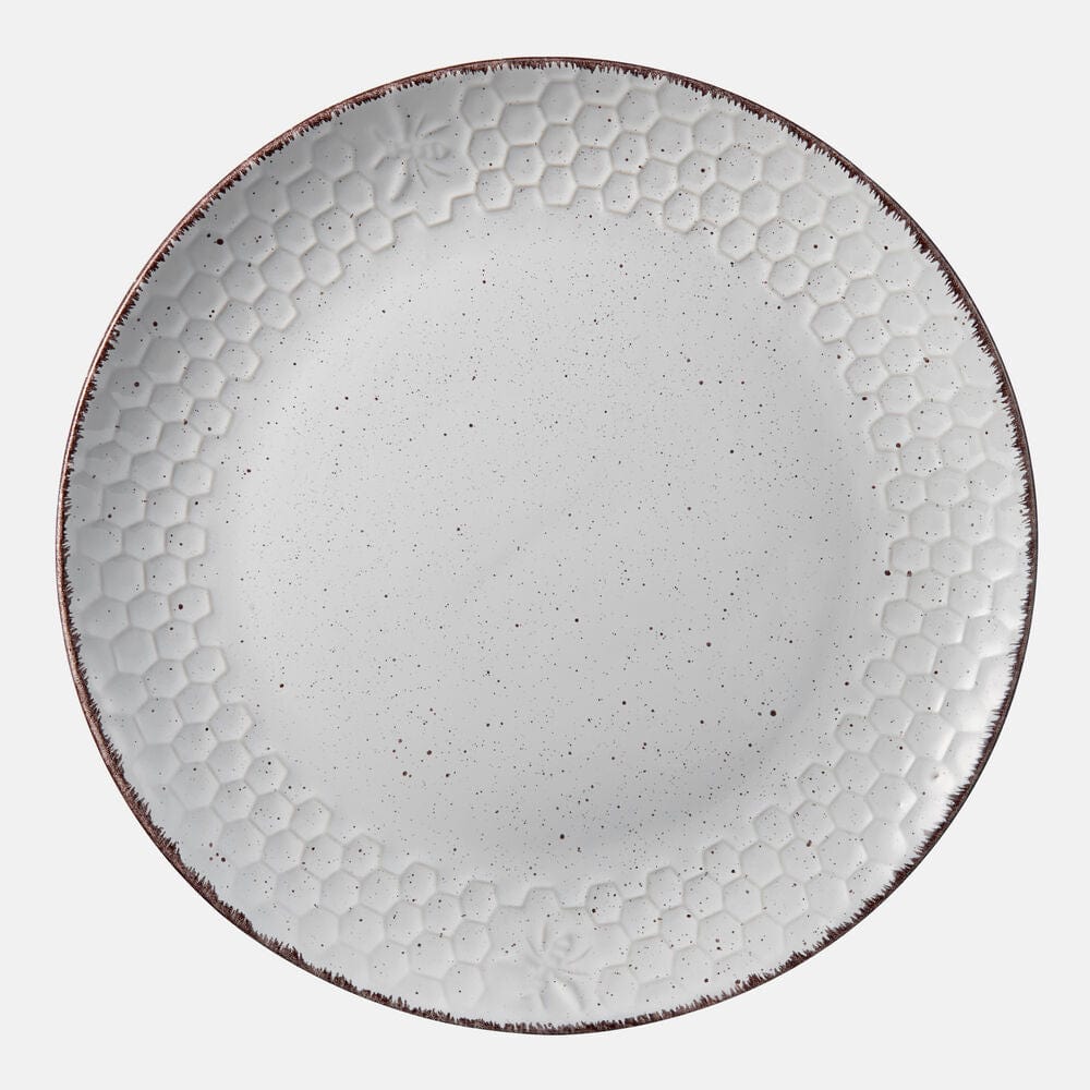 Close-up of reactive glaze dinnerware set showing the unique color variations