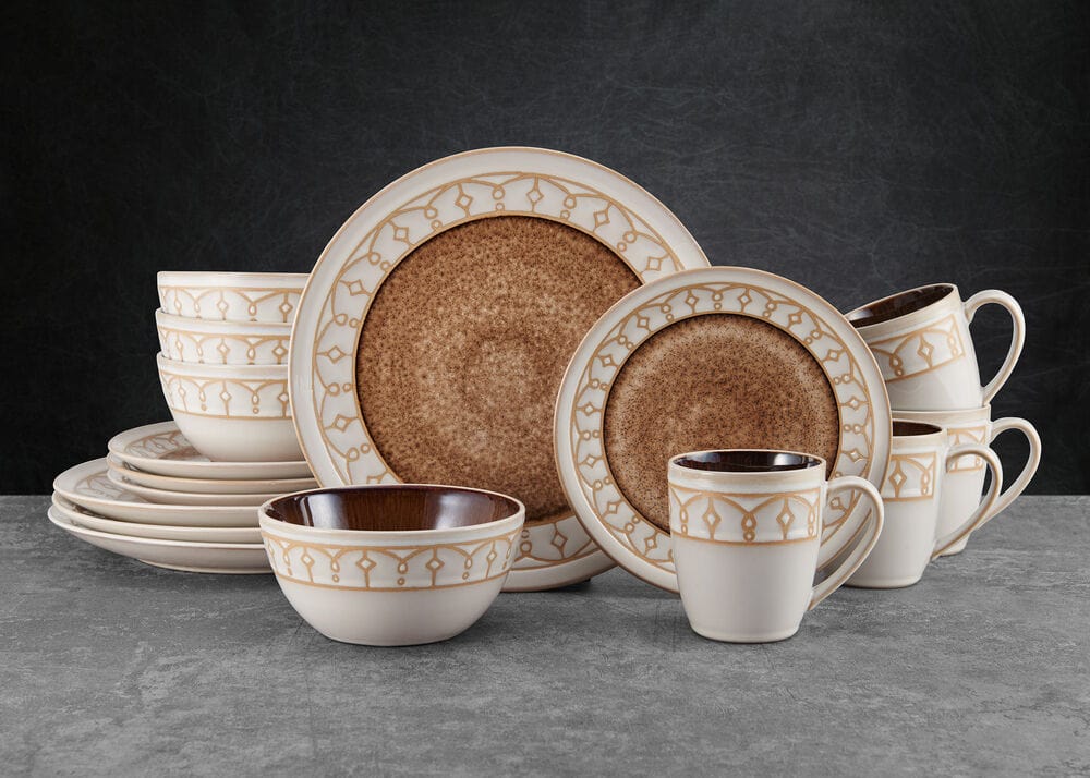 Close-up of the beige speckled stoneware dinner plate with artistic glaze