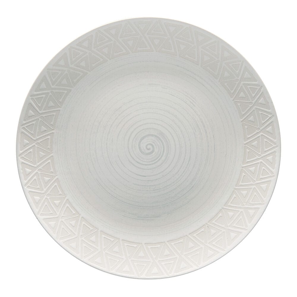 Vera dinnerware set for 4, showing dinner plates and mugs on a modern table
