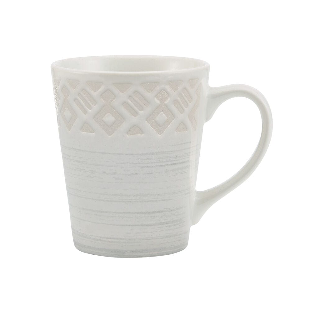 Vera dinnerware set for 4, showing dinner plates and mugs on a modern table
