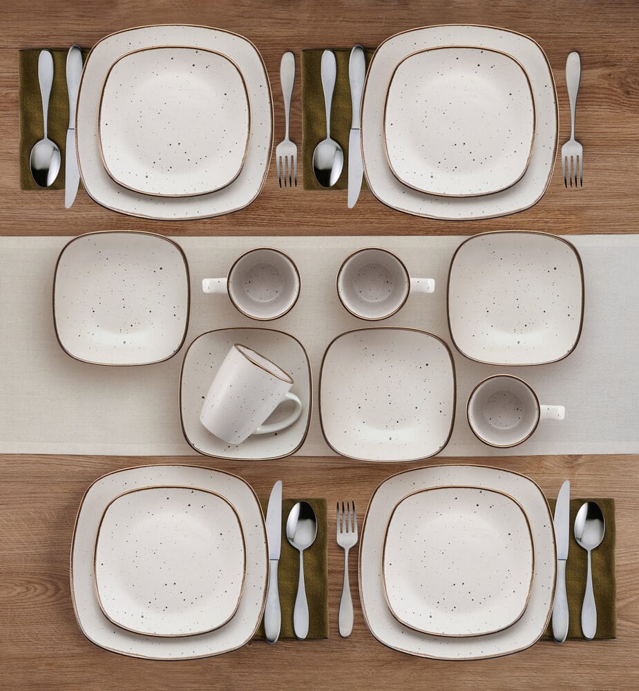 Close-up of dinnerware set for 4, showcasing durable stoneware and elegant finish