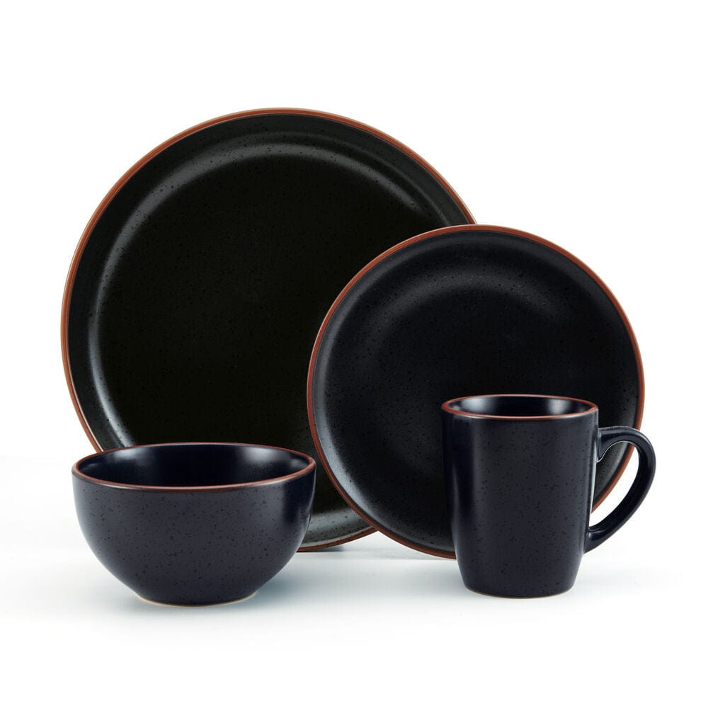 Hunter Black dinnerware set displayed on a dining table, showcasing its modern design and glossy speckles.