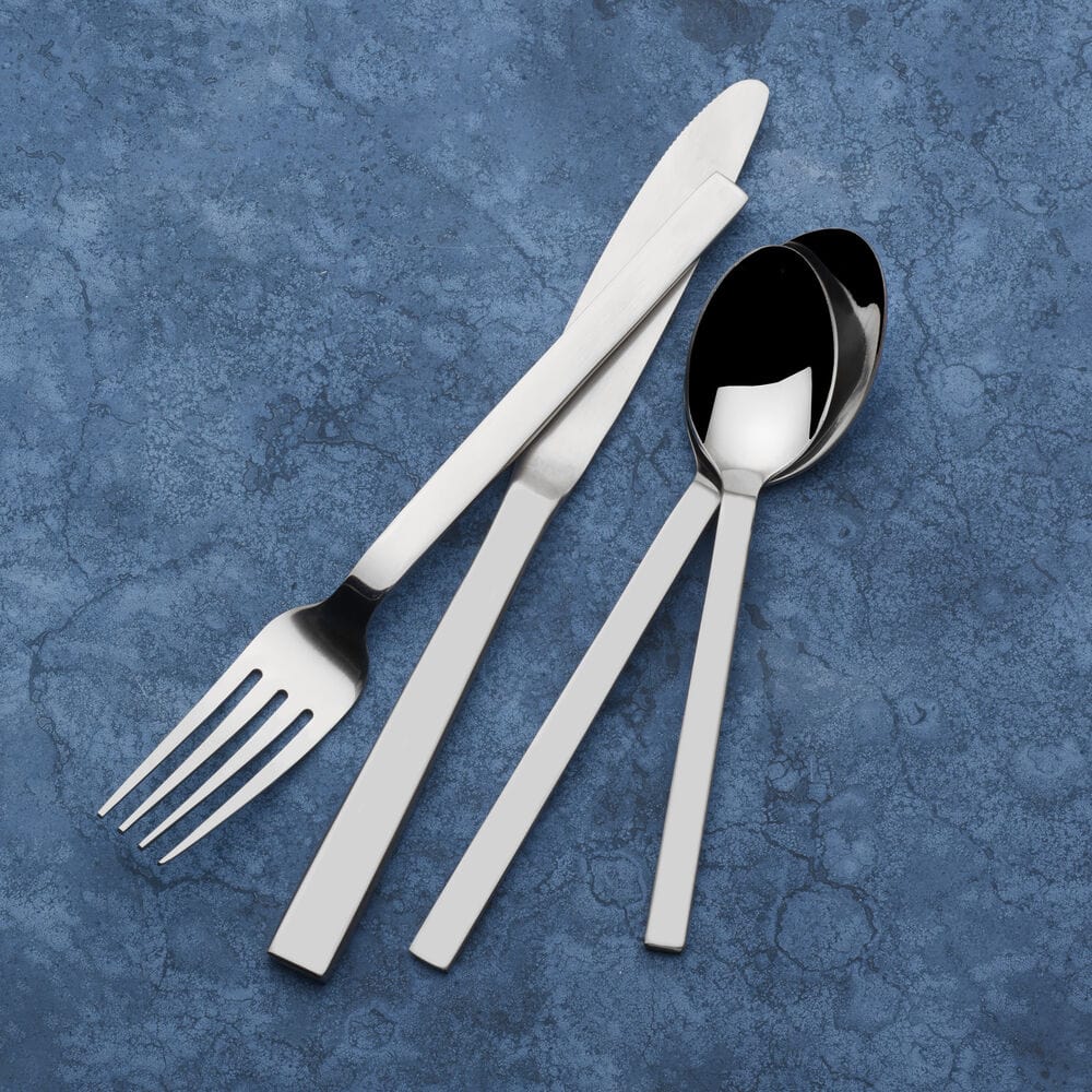 Close-up of the sleek handle design on the Graciela flatware set