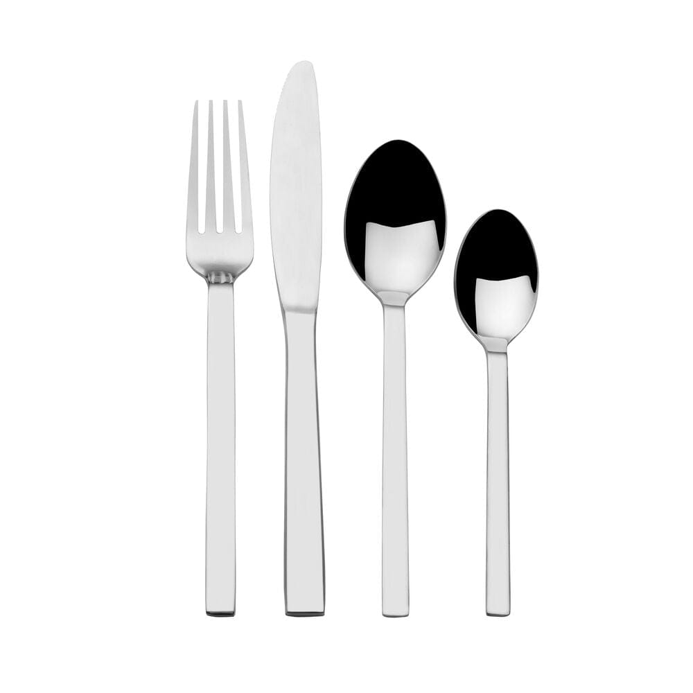 Flatware set arranged on a modern dining table for dinner party
