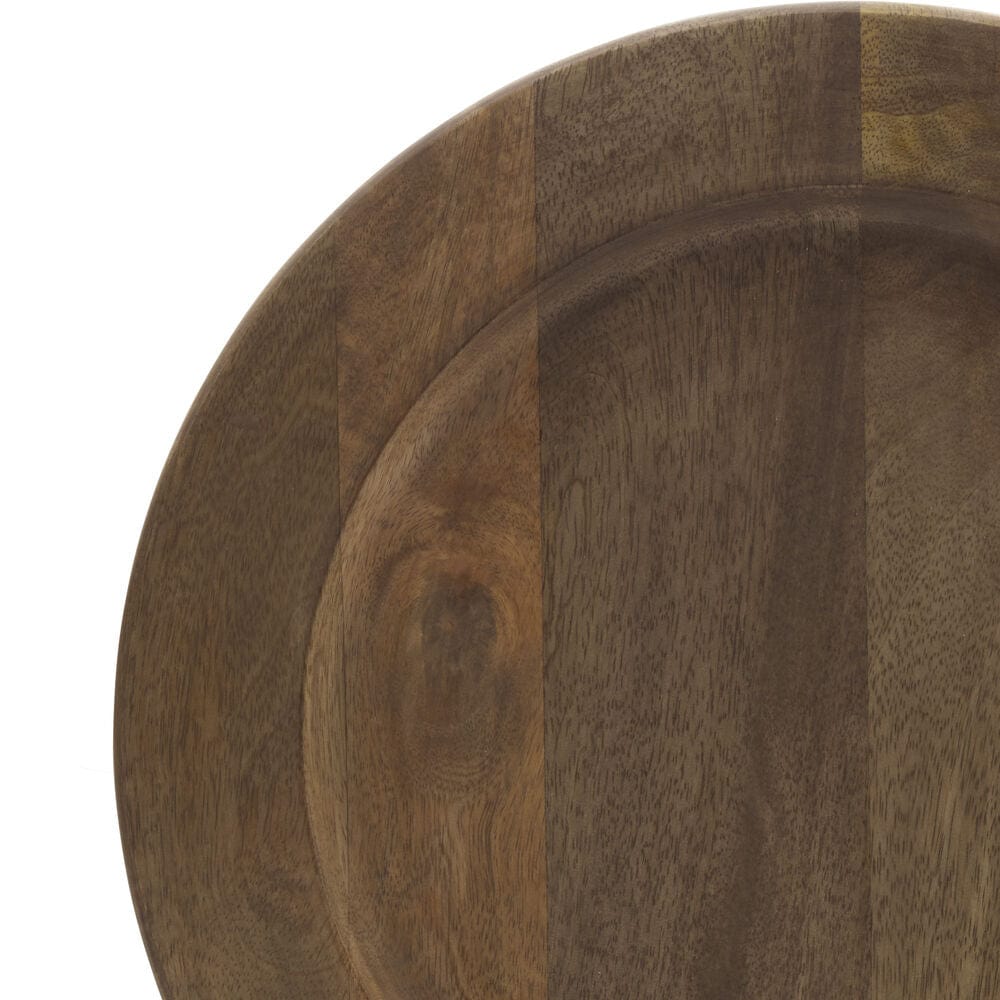 Close-up of natural mango wood charger plates with rustic finish
