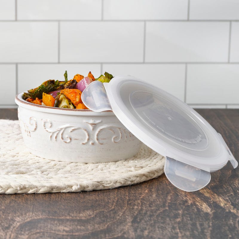White storage bowl with lid showing secure snap-down clips for spill-proof storage