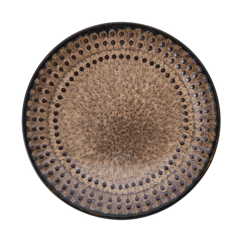 Close-up of Cambria stoneware appetizer plates with embossed beading design