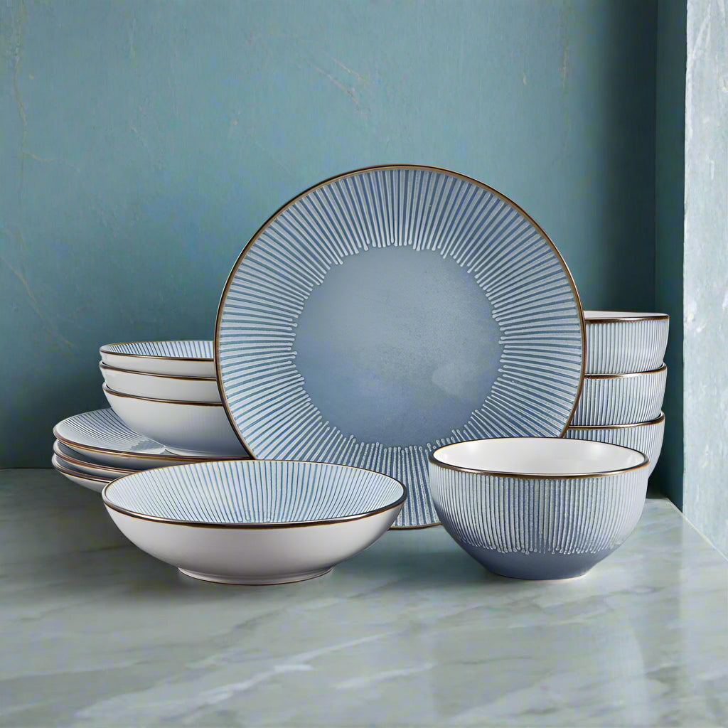 Elegant blue dinnerware set displayed on a contemporary dining table