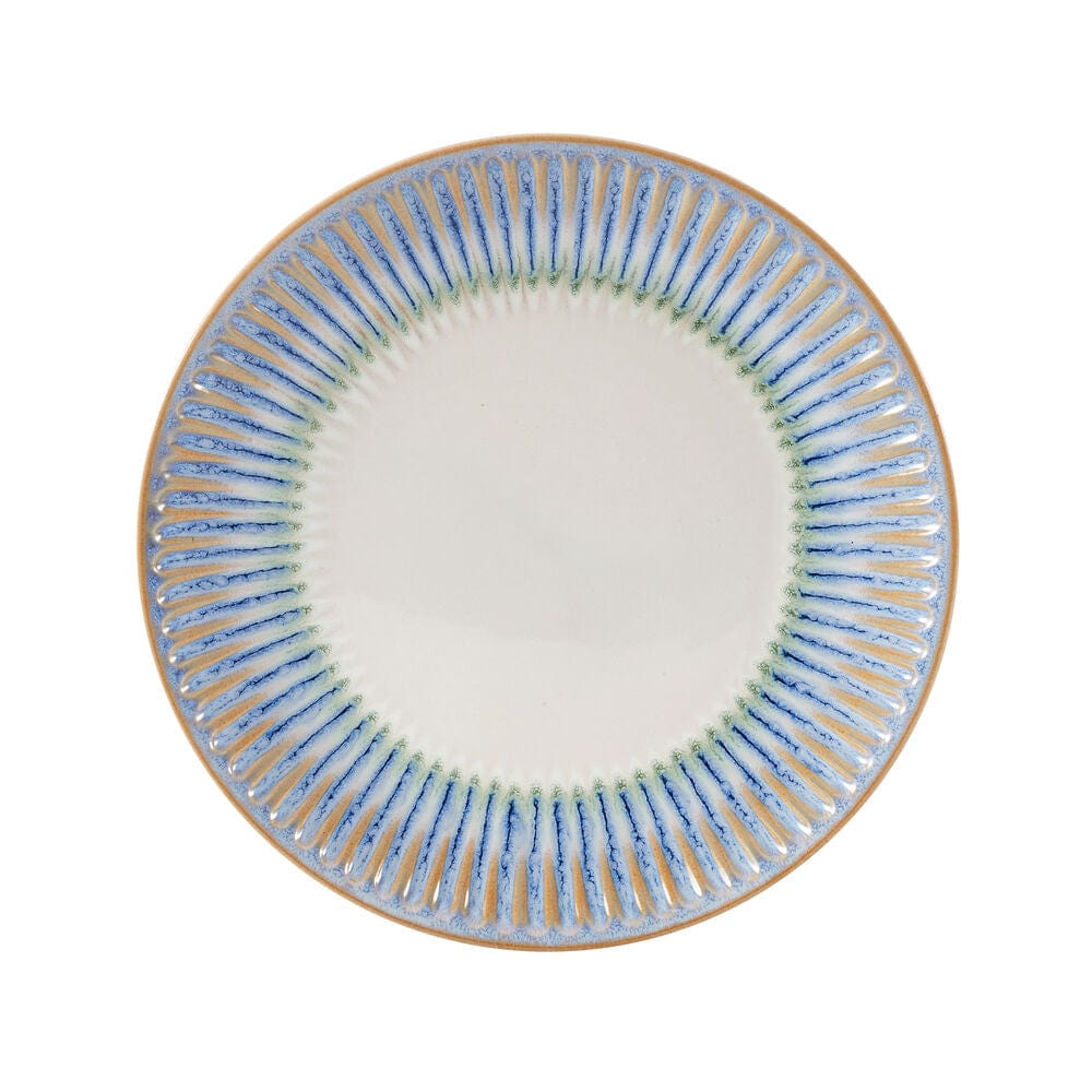 Set of Hensley Blue stoneware dinner plates, salad plates, and bowls on a dinner table