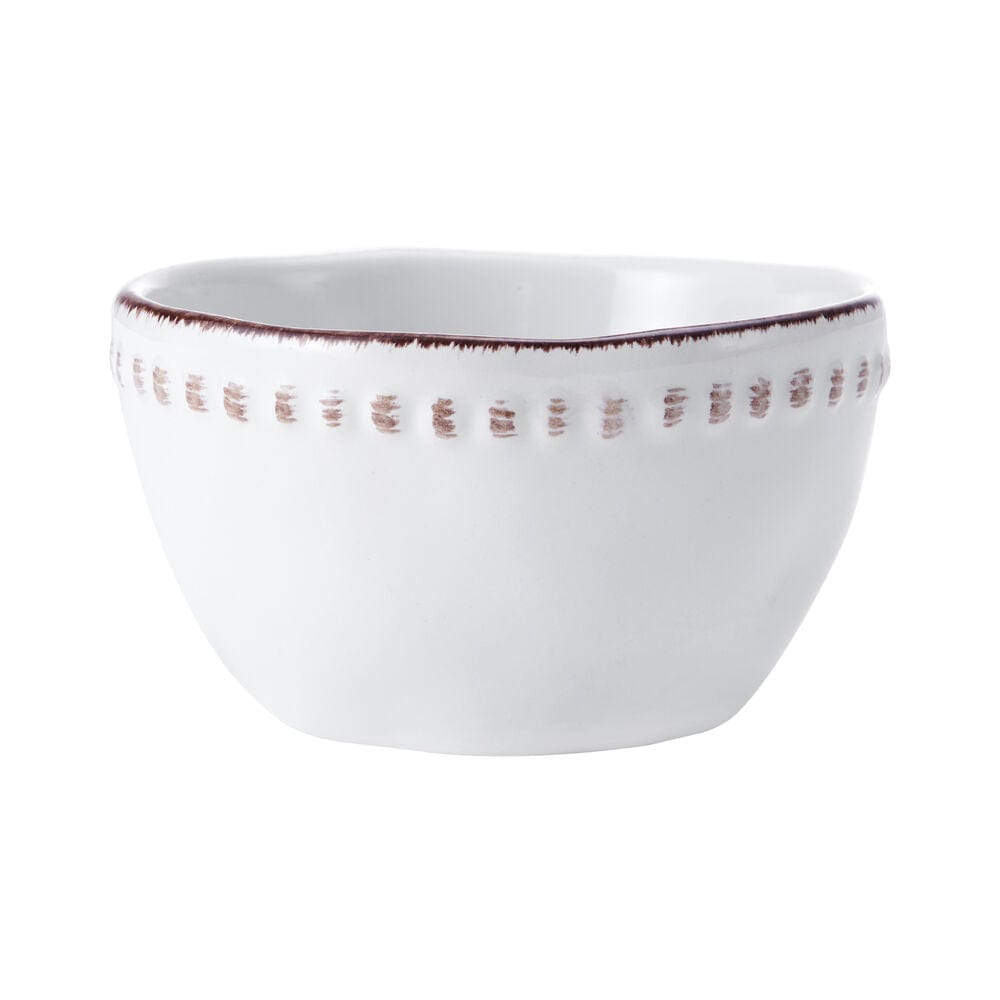 Close-up of the beaded rim on the rustic stoneware fruit bowls
