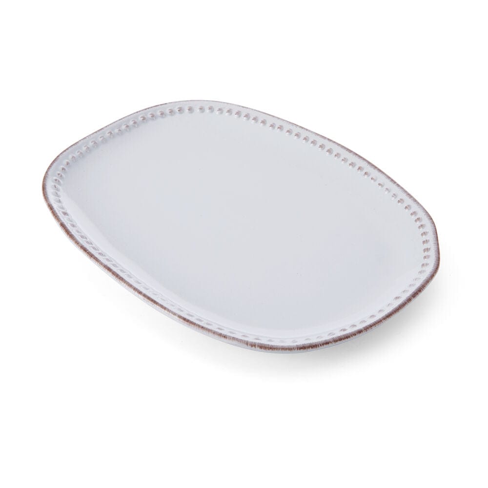 Close-up of the rustic Canyon Bead ceramic platter showing beaded rim and textured surface