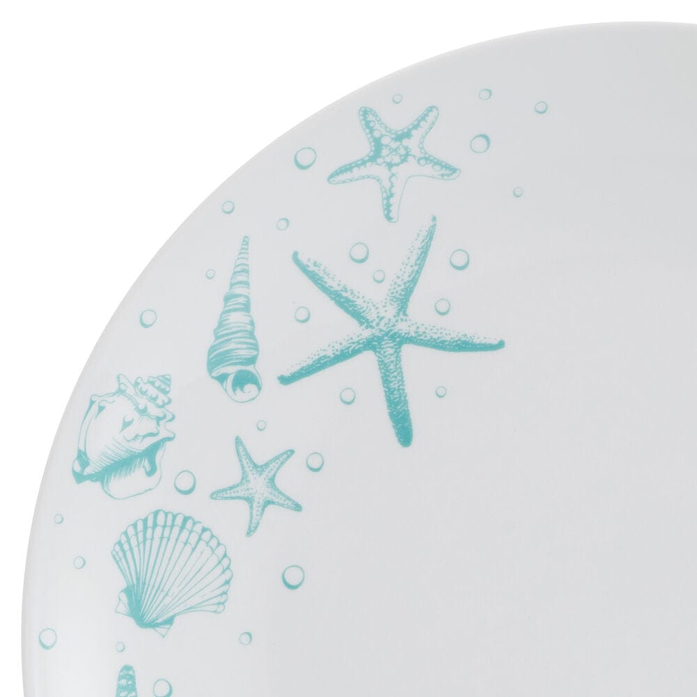 Family enjoying a meal with beach-inspired dinnerware set in a sunny kitchen