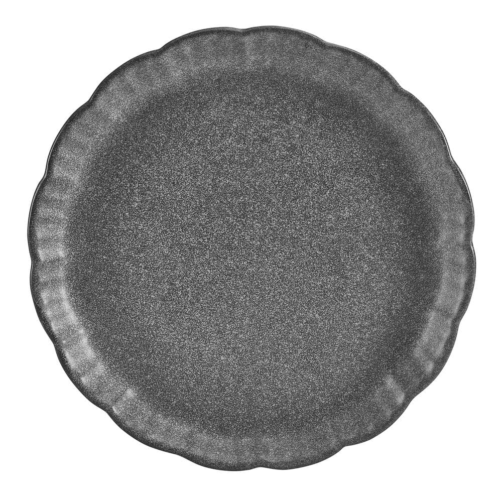 Stacked Noah dinner plates displaying the organic shape and beautiful finish.
