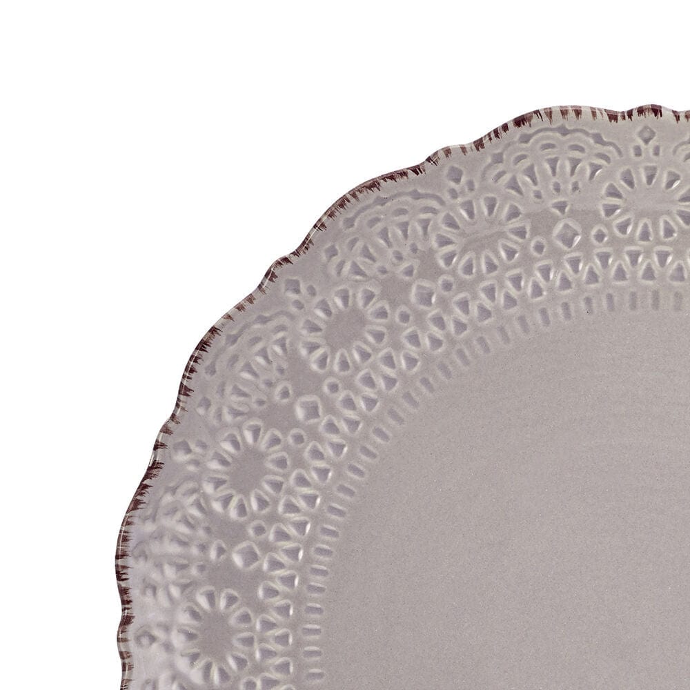 Close-up of Chateau Smoke dinnerware set with scalloped edges and antique rim detail