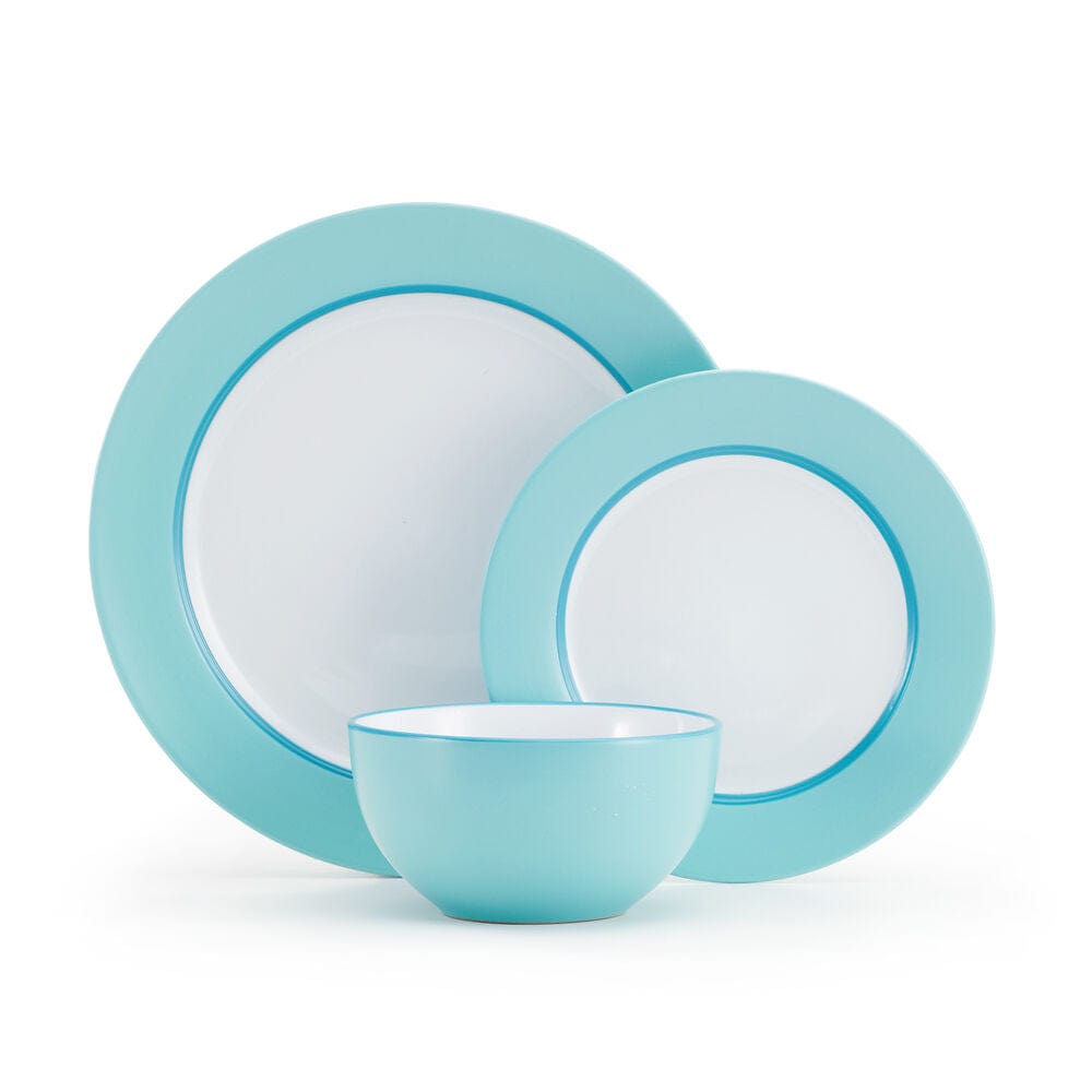 Grayson teal dinnerware set featuring dinner plates and bowls on a table setting.
