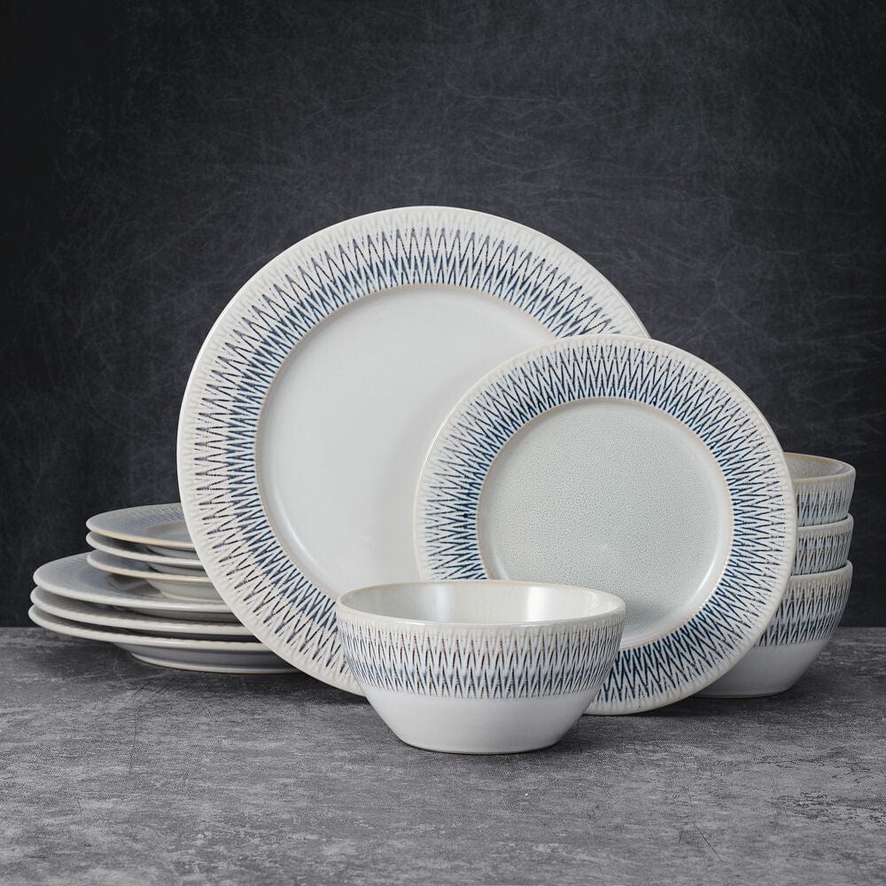 Casey Stoneware Dinnerware Set for 4, featuring embossed border, placed on a dining table.