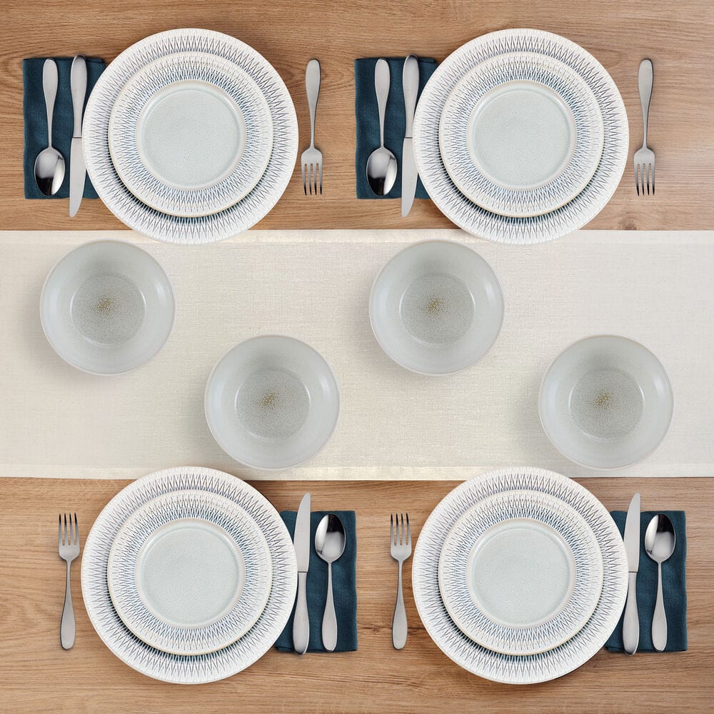 Casey Stoneware Dinnerware Set for 4, featuring embossed border, placed on a dining table.