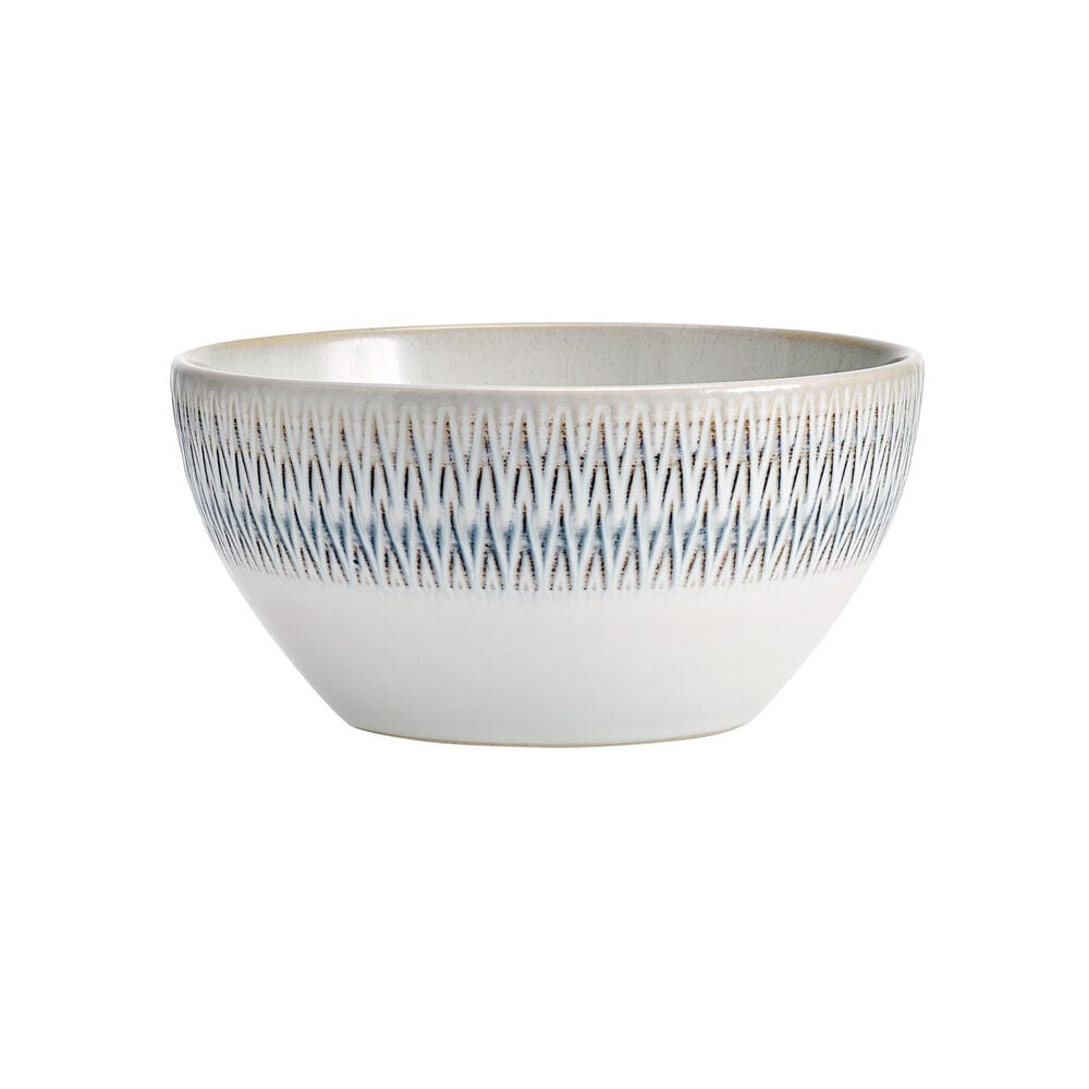 Close-up of Casey Stoneware dinnerware set for 4, showing the unique embossed details and hand-crafted finish.