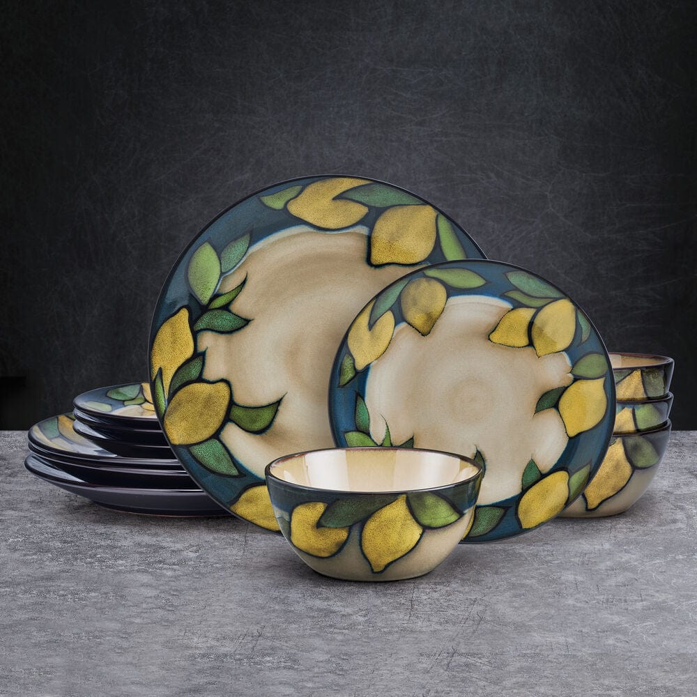 Close-up of ceramic dinner plates with lemon design and blue border