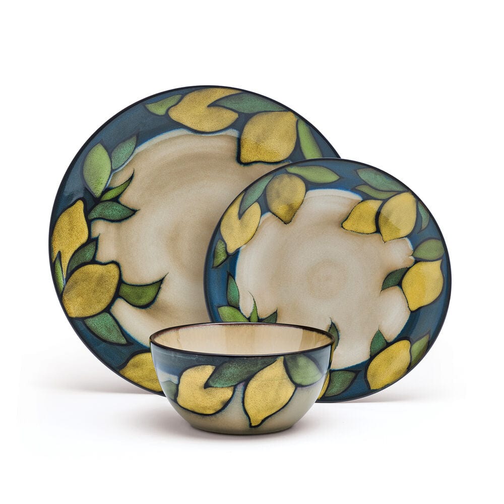 Close-up of ceramic dinner plates with lemon design and blue border