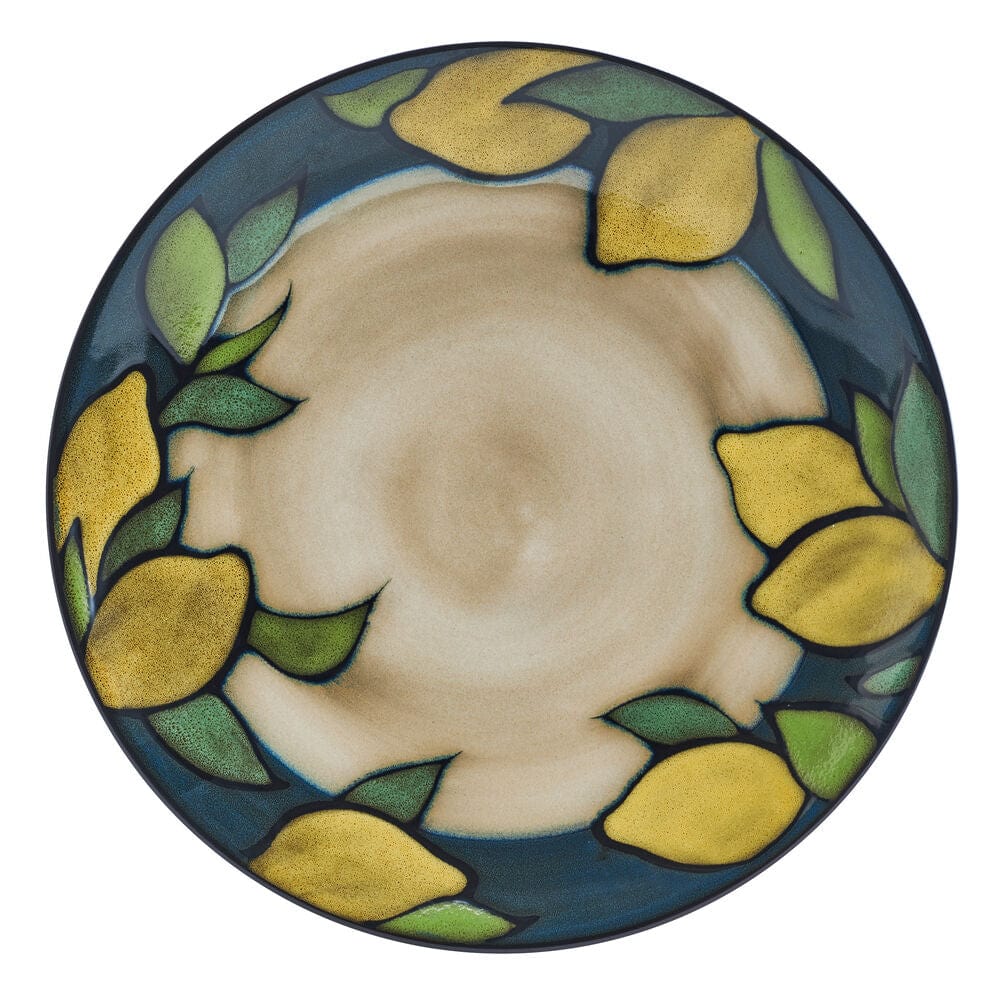 Close-up of ceramic dinner plates with lemon design and blue border