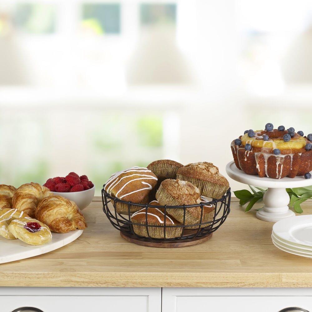 Elegant centerpiece basket placed in a modern kitchen setting.