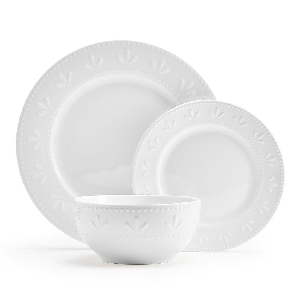 Elegant porcelain dinnerware set with embossed rims for four, perfect for special occasions