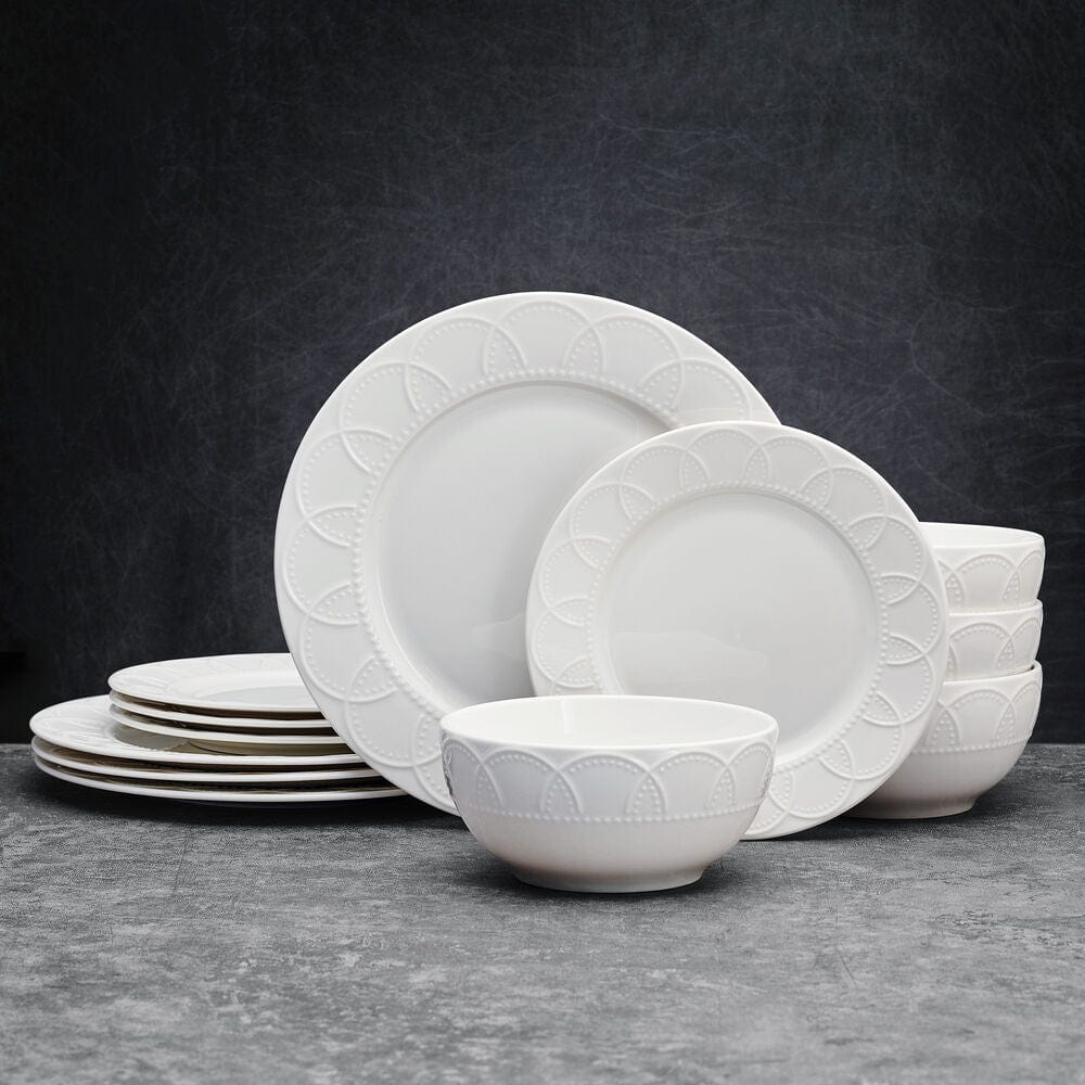 Elegant porcelain dinnerware set displayed on a dining table for light entertaining