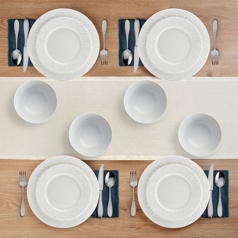 Jules porcelain dinnerware set with embossed design on dinner plates and bowls