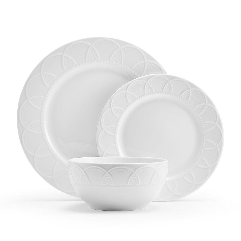 Jules porcelain dinnerware set with embossed design on dinner plates and bowls
