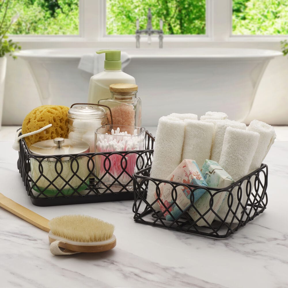Juliette multi-tier wire storage basket displaying fresh fruits on a kitchen counter.