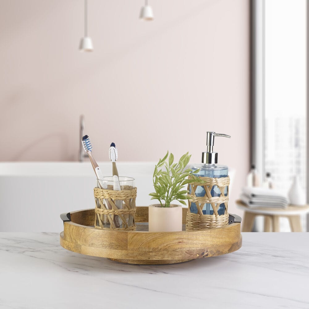 Elegant gray marble lazy Susan serve tray showcasing appetizers and snacks.
