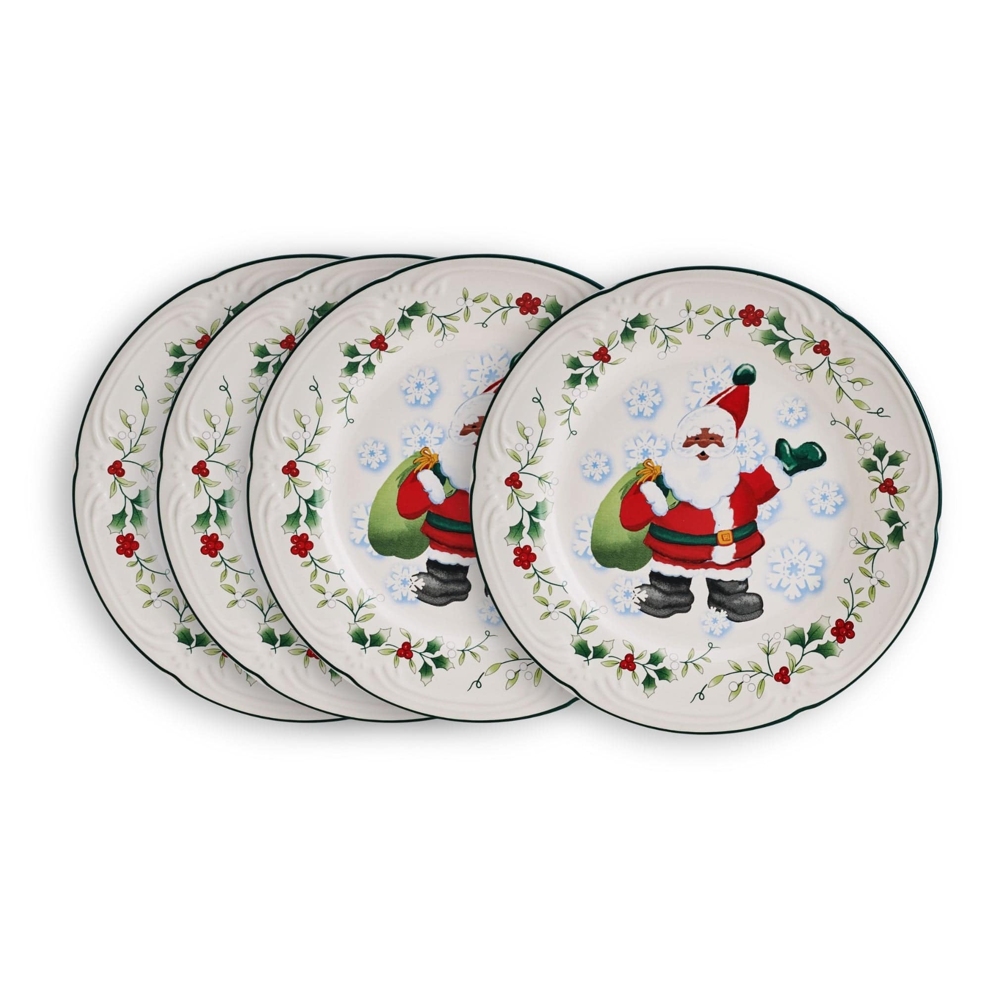Side view of set of four Santa dinnerware plates stacked neatly on a holiday-themed table setting.