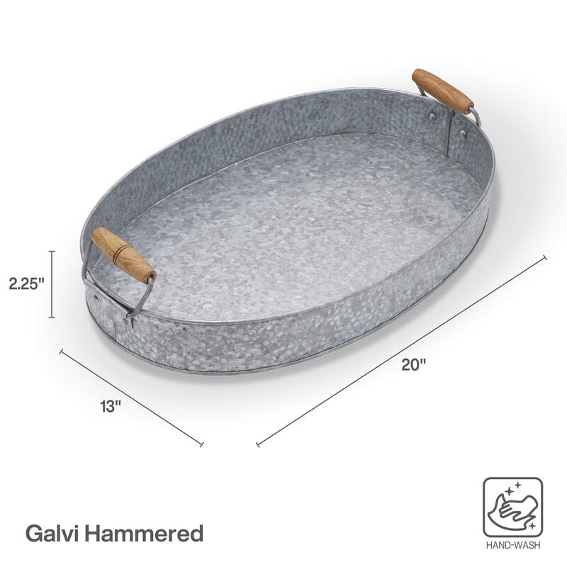 Galvanized oval tray with wooden handles, ideal for both indoor and outdoor use.