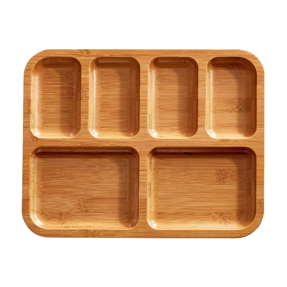 Close-up of compartments filled with cheese, fruits, and nuts on the charcuterie board
