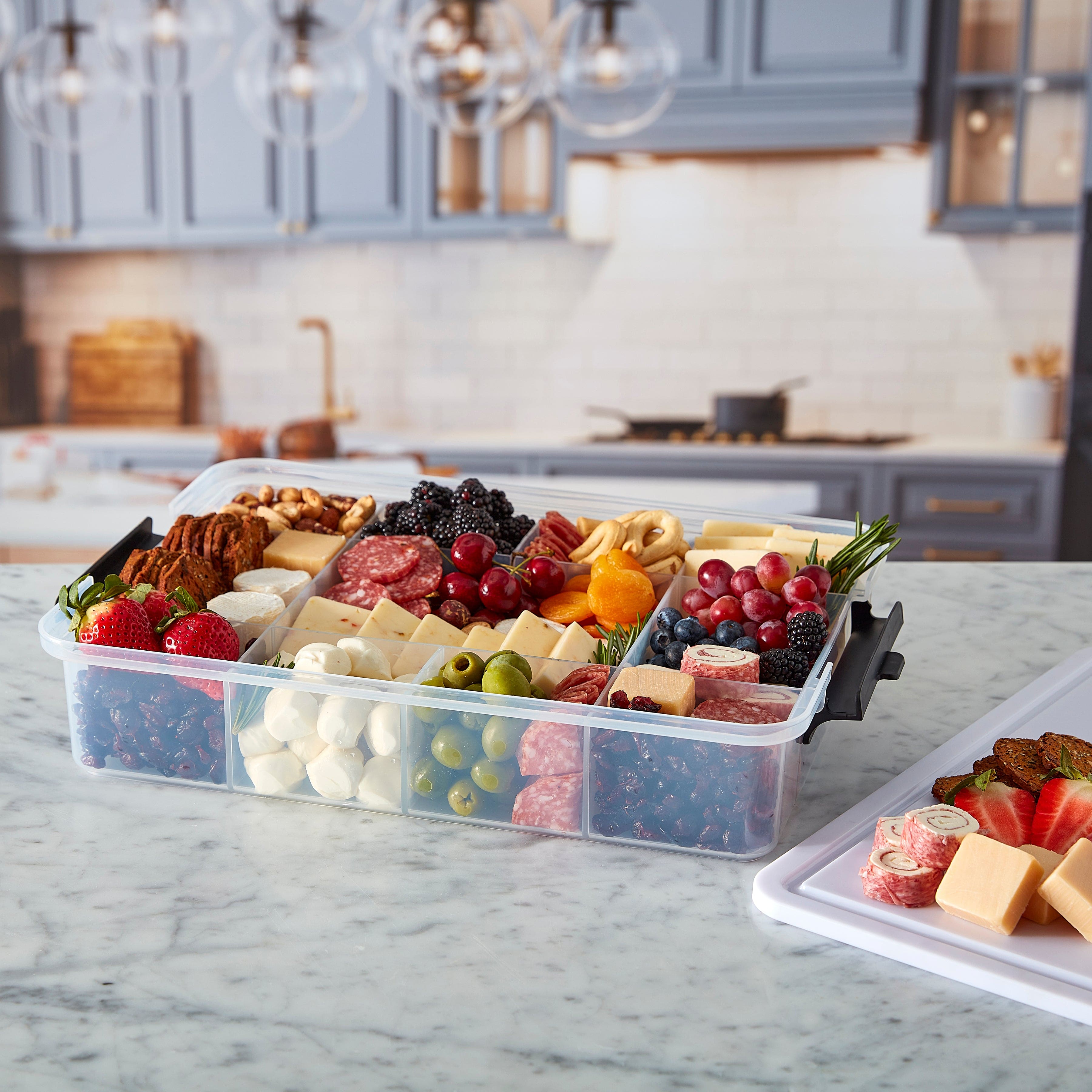 Close-up of Farberware Build-A-Board with locking lid and compartments for snack storage