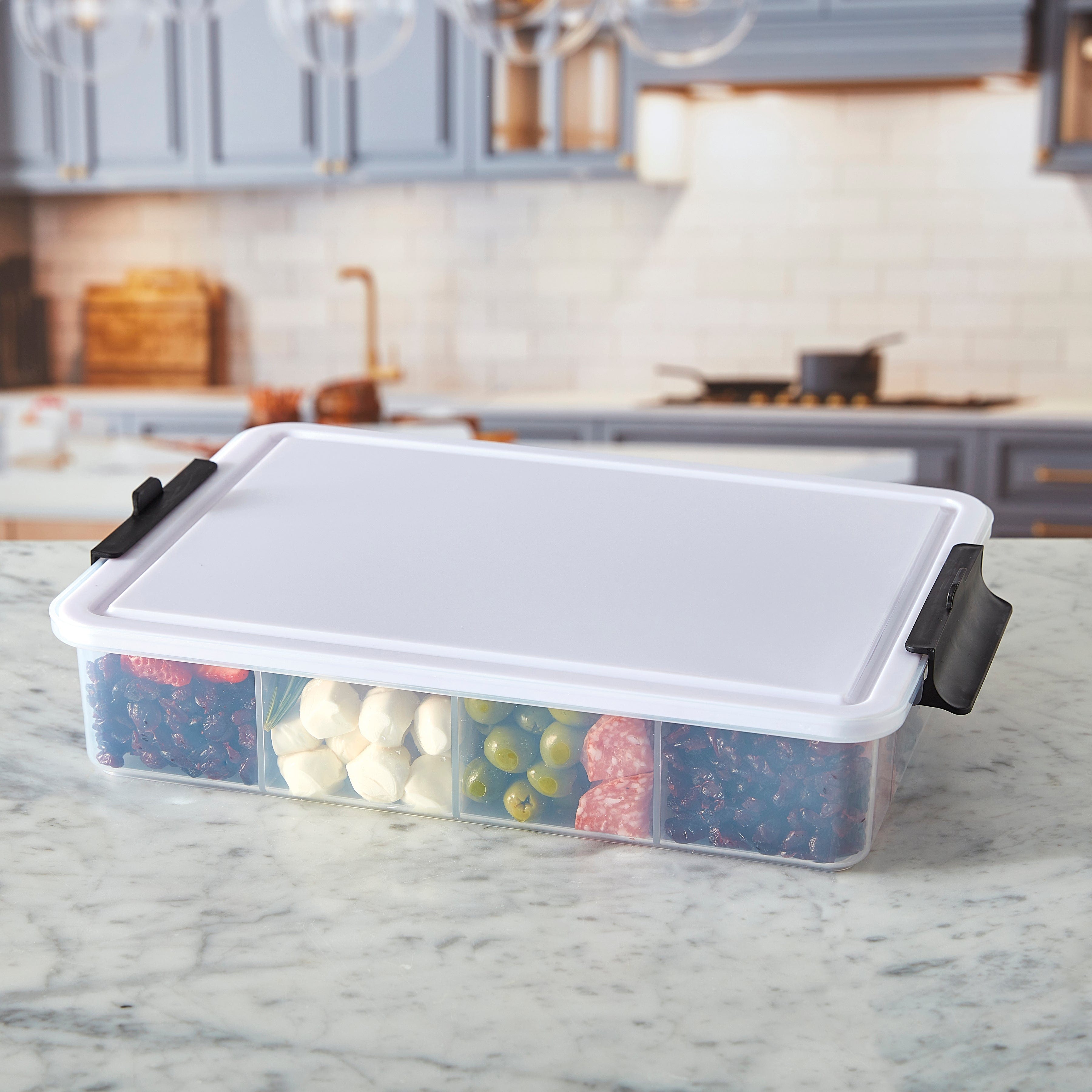 Person using the reversible cutting board lid for food prep on the go