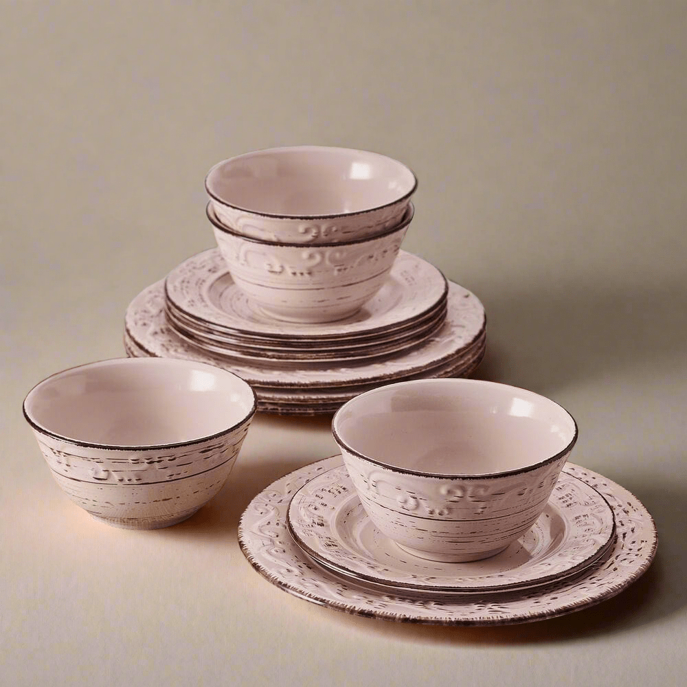 Charming pink stoneware dinnerware set displayed on a modern table setting.