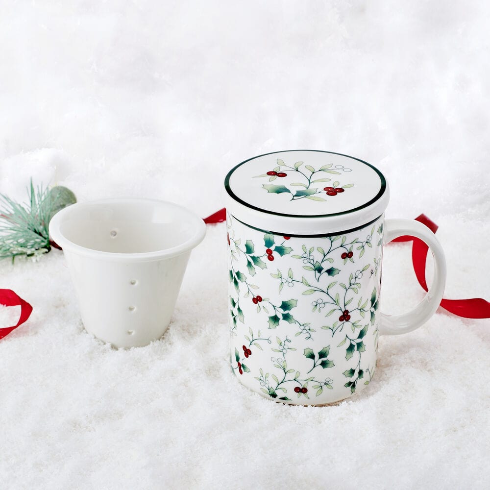 White porcelain tea mug with infuser and lid, Winterberry design, side view
