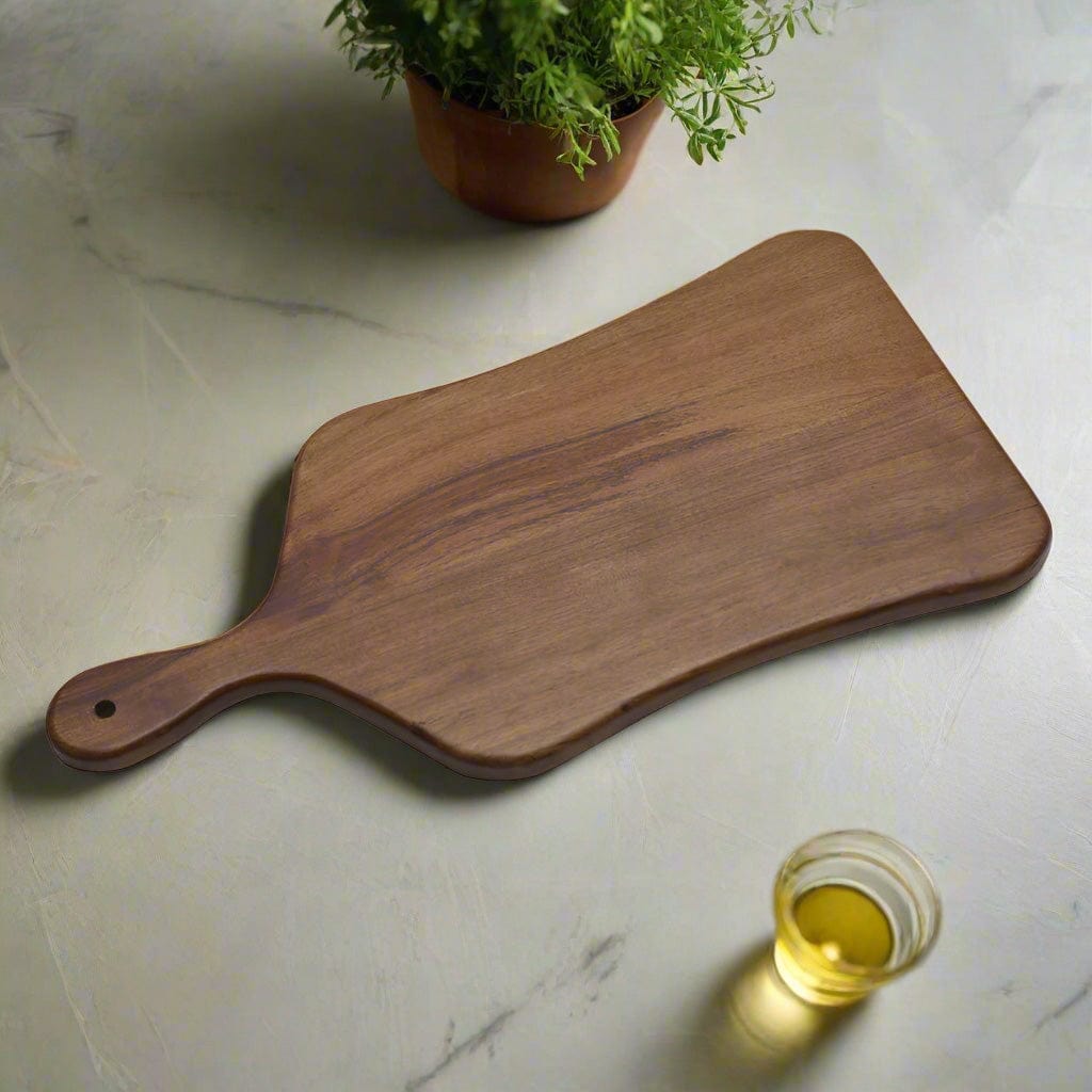 Close-up of the elegant acacia wood serving board showcasing unique grain patterns, perfect for cheese and charcuterie.