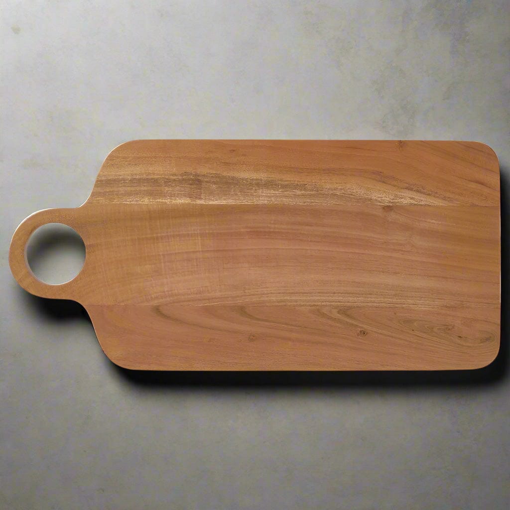 Close-up of acacia wood cheese board with cheese and fruits, ideal for charcuterie presentations