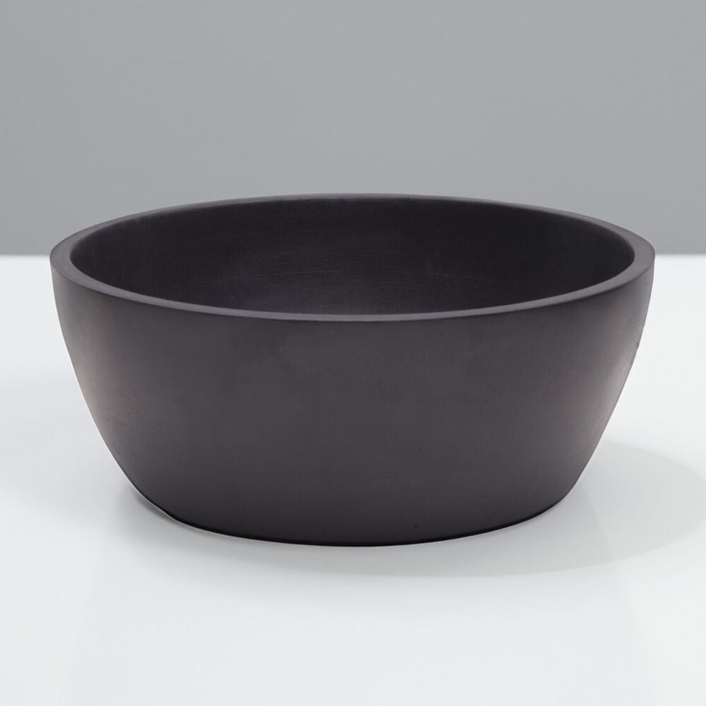 Close-up of black mango wood serve bowl with detailed grain pattern