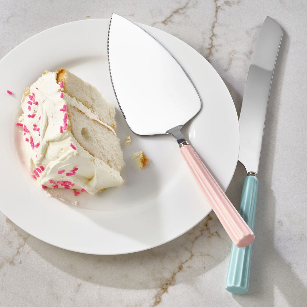 Close-up of stainless steel cake knife with serrated blade for precise slicing