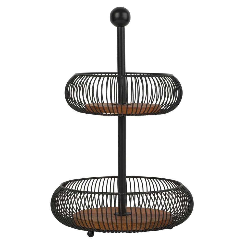 Stylish tiered basket on kitchen counter filled with fresh fruits and vegetables