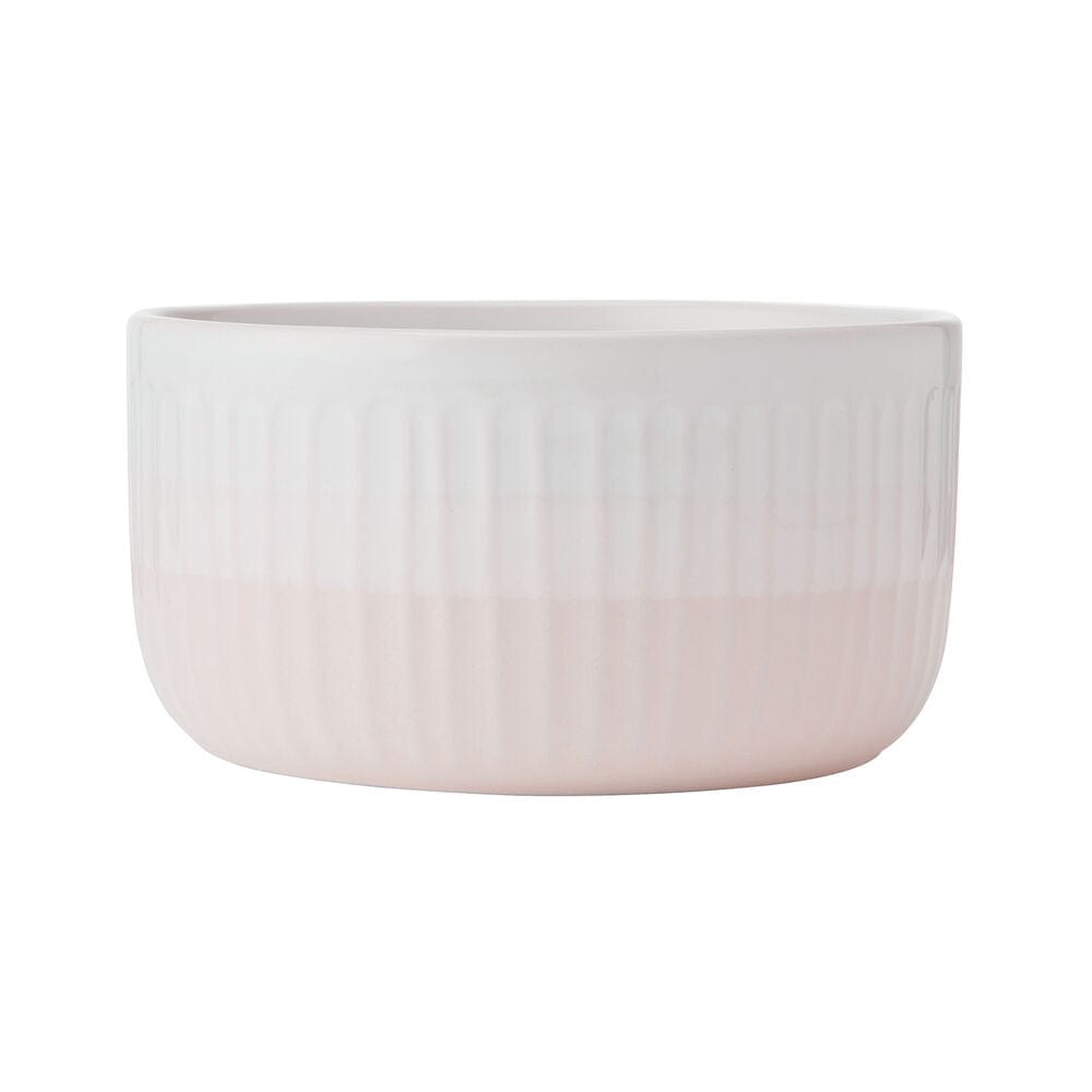 Close-up of blush dinnerware set with textured details for everyday use