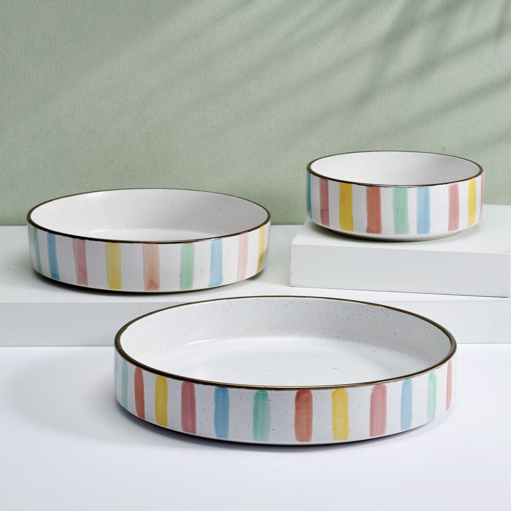 Close-up of vibrant striped dinnerware set ideal for summer dining