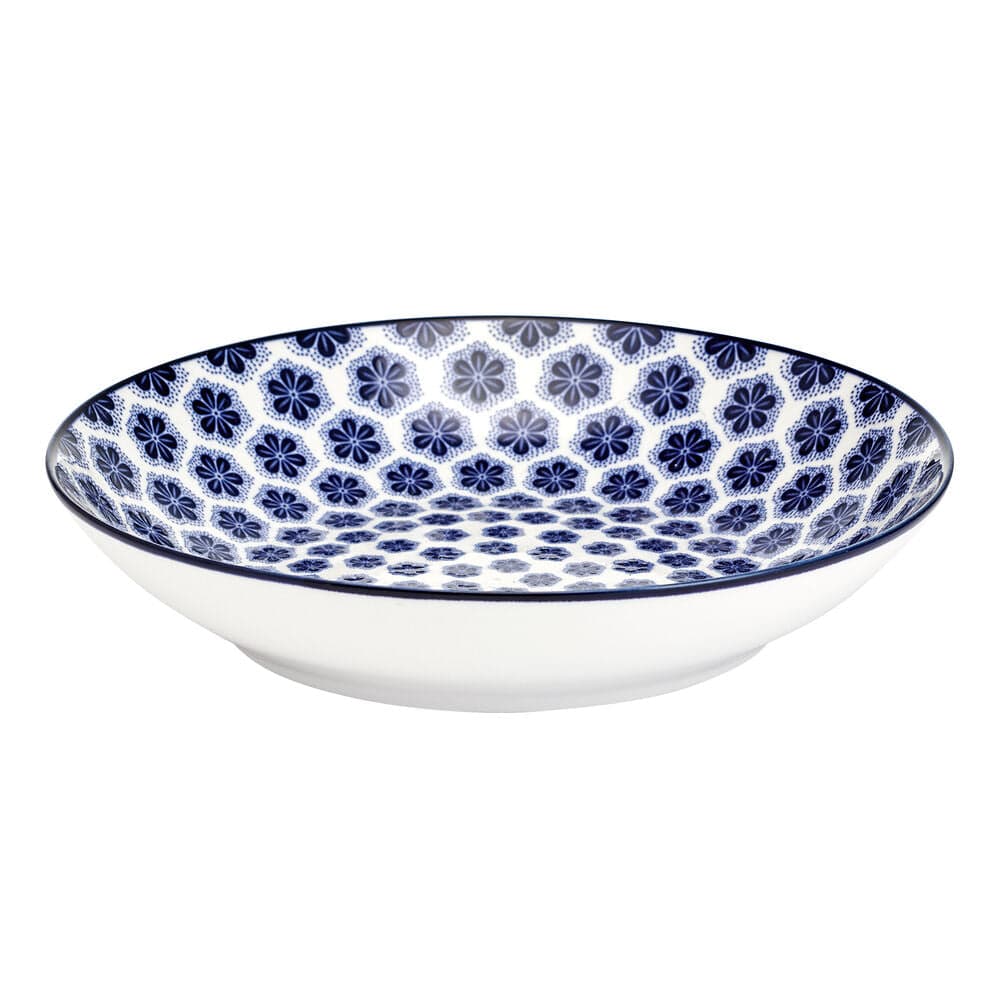 A beautifully set table with the floral dinnerware set for 4, perfect for casual dining.