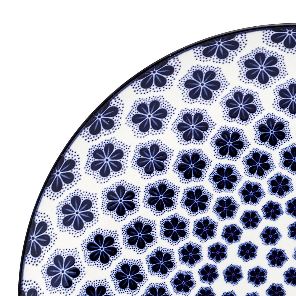Modern dinner plates with floral pattern, showcasing vibrant colors and intricate designs.