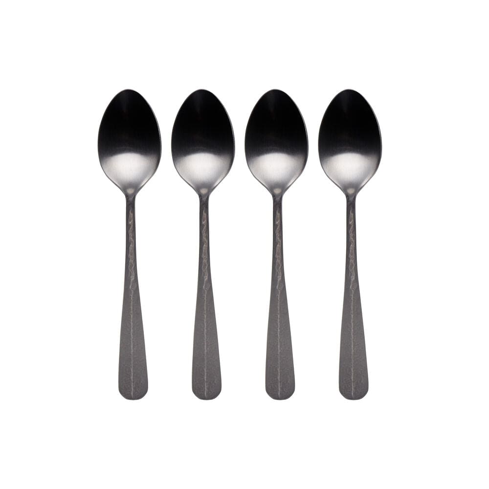 Close-up of one spoon in an espresso cup showing size and elegance